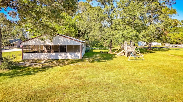 view of yard with a playground