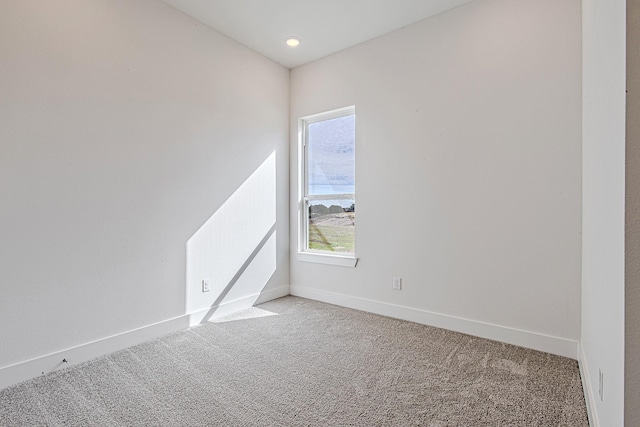 view of carpeted spare room