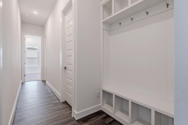 mudroom with dark hardwood / wood-style floors