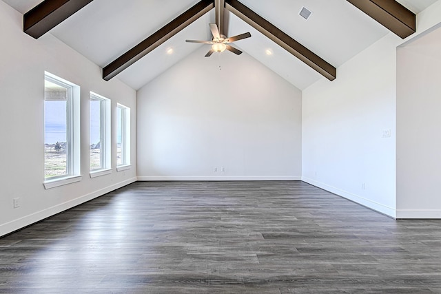 interior space with dark wood-type flooring, ceiling fan, and vaulted ceiling with beams