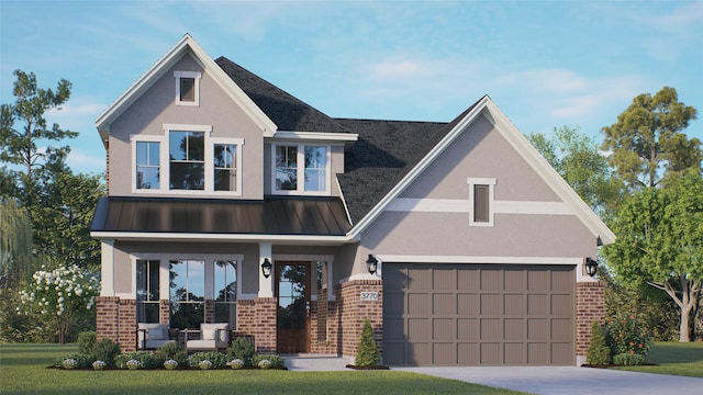 view of front of home with a garage and a front yard