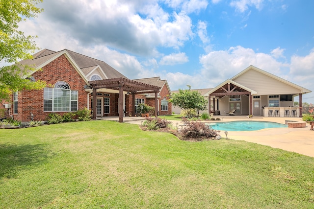 view of pool featuring a pergola, a yard, and a patio area