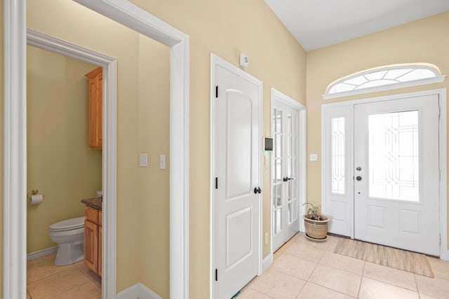 entrance foyer featuring light tile patterned floors