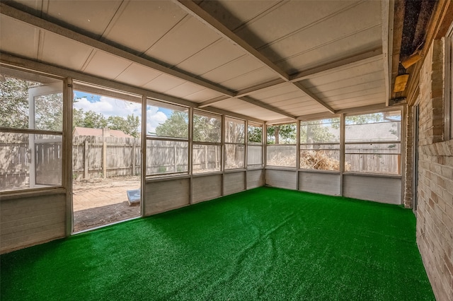 unfurnished sunroom featuring plenty of natural light