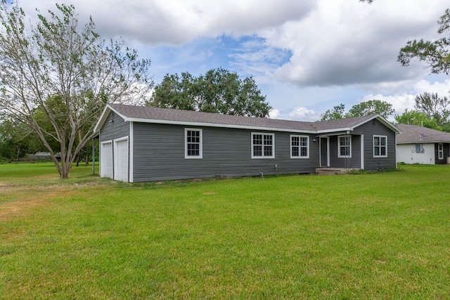 exterior space with a garage and a front yard