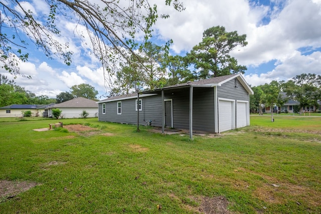 view of yard with a garage