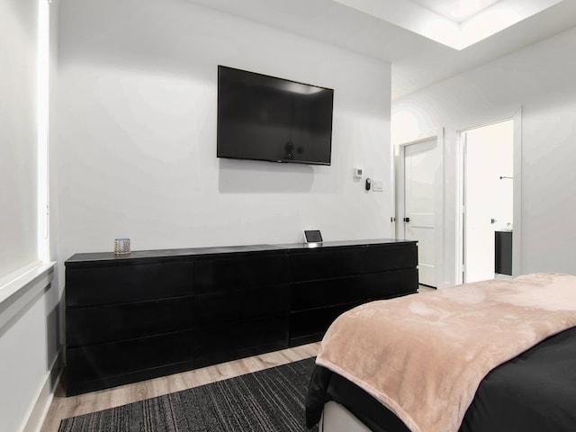 bedroom featuring light wood-type flooring