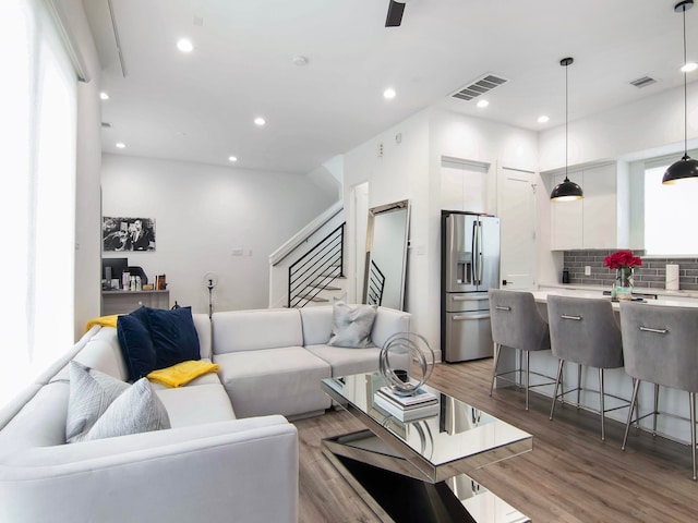 living room with wood-type flooring