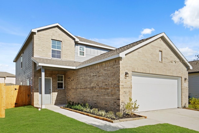 craftsman-style home featuring a front lawn and a garage