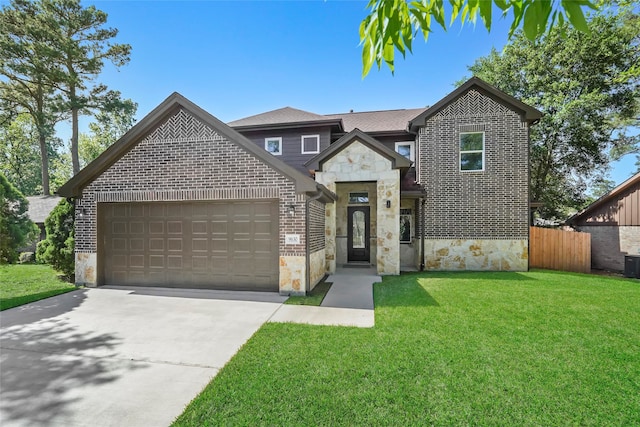 view of front of property featuring cooling unit, a garage, and a front lawn