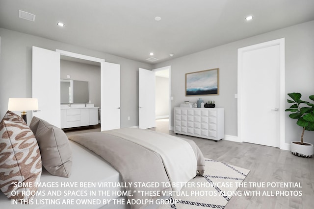 bedroom featuring light hardwood / wood-style flooring