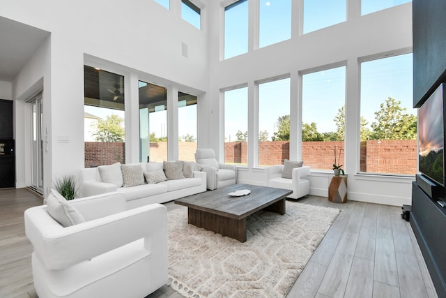 living room with light hardwood / wood-style flooring