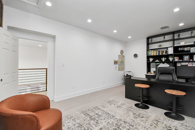 office space featuring light hardwood / wood-style floors