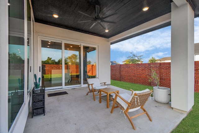 view of patio / terrace featuring ceiling fan