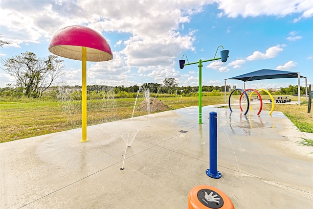 exterior space featuring a yard and a playground