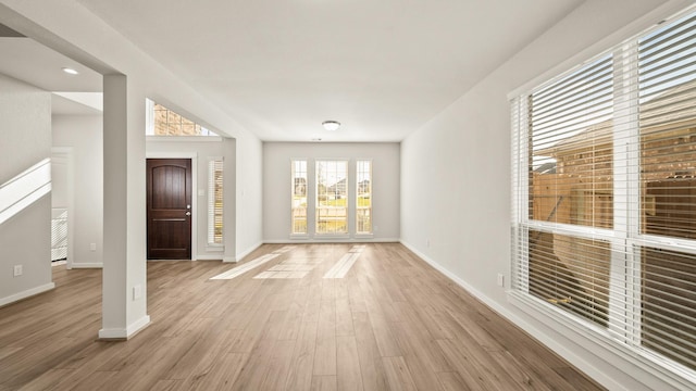 entrance foyer featuring light hardwood / wood-style floors