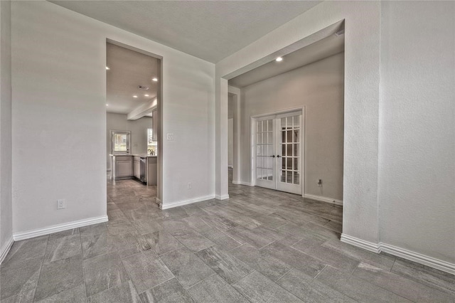 spare room with french doors