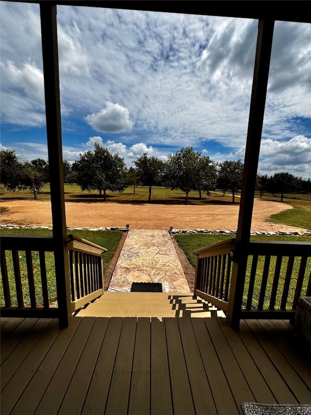 wooden deck with a yard