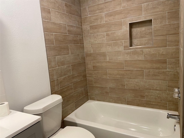 full bath with tub / shower combination, vanity, and toilet