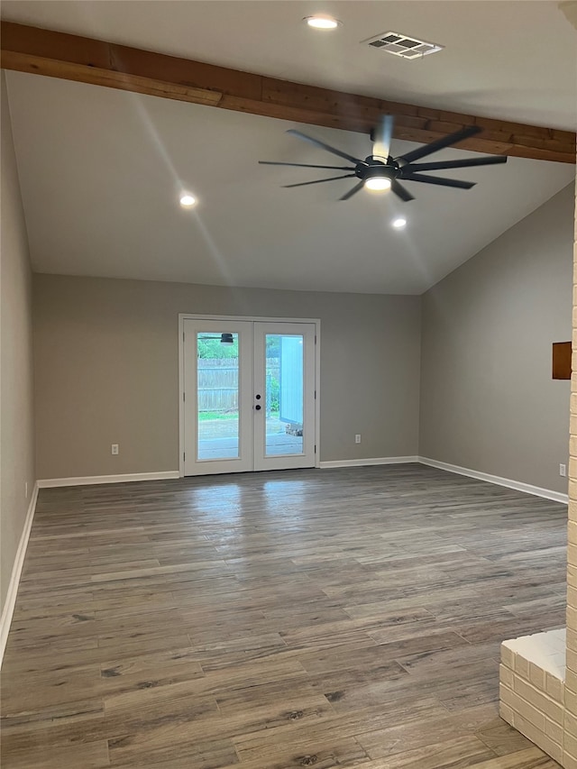 unfurnished living room with french doors, hardwood / wood-style flooring, ceiling fan, and vaulted ceiling with beams