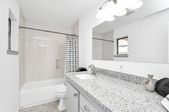 full bathroom with toilet, shower / bath combo with shower curtain, and vanity