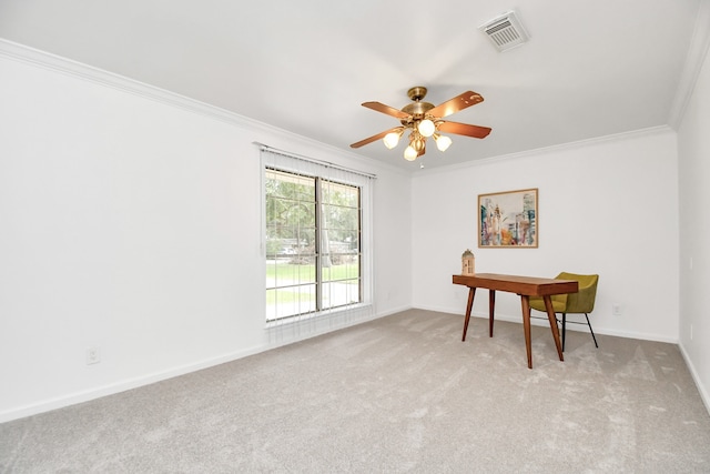 empty room with crown molding, light colored carpet, and ceiling fan