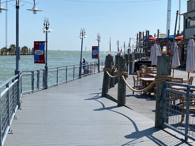 view of dock with a water view