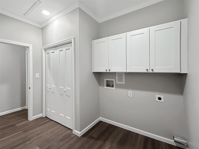 washroom with cabinets, electric dryer hookup, ornamental molding, washer hookup, and dark wood-type flooring