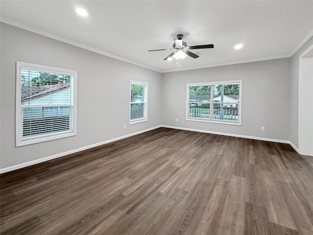 spare room featuring wood-type flooring and a wealth of natural light