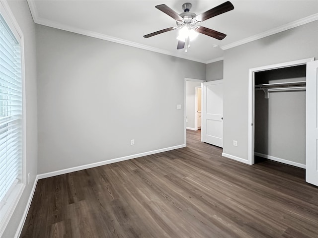 unfurnished bedroom with ornamental molding, hardwood / wood-style floors, and ceiling fan