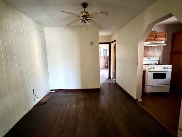 corridor with dark hardwood / wood-style floors