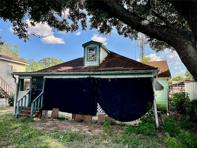 view of property exterior featuring entry steps