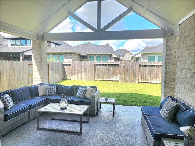 view of patio featuring an outdoor hangout area and a fenced backyard