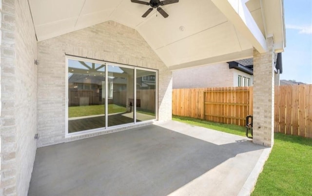 view of patio / terrace featuring ceiling fan and fence