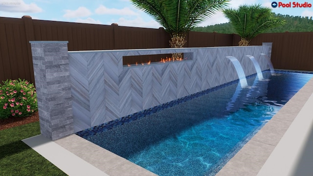 view of swimming pool with fence