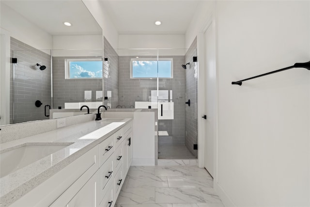 bathroom with vanity and walk in shower