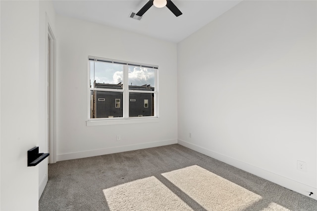 carpeted empty room with ceiling fan