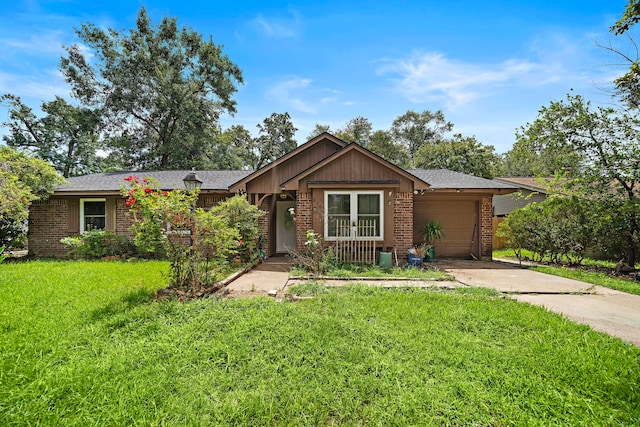 ranch-style house with a front lawn and a garage