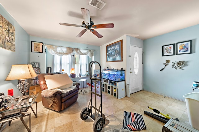 interior space with ceiling fan