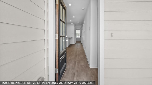 hallway with dark wood-type flooring