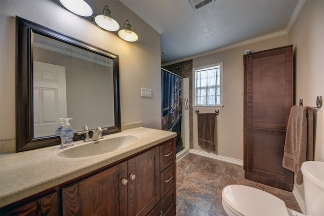 bathroom with vanity, toilet, ornamental molding, and a textured ceiling