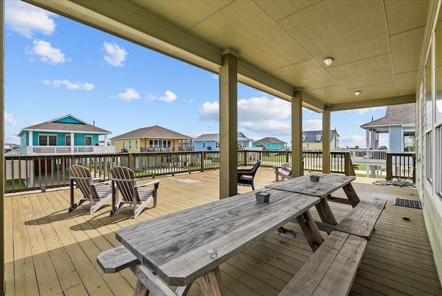 119 Velasco Shores Dr, Surfside Beach, TX 77541 - wooden terrace with a residential view and outdoor dining space