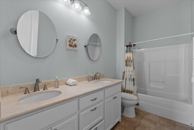 full bathroom featuring shower / bath combo, vanity, toilet, and tile patterned floors