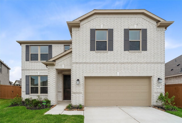 traditional-style house featuring concrete driveway, an attached garage, brick siding, and fence