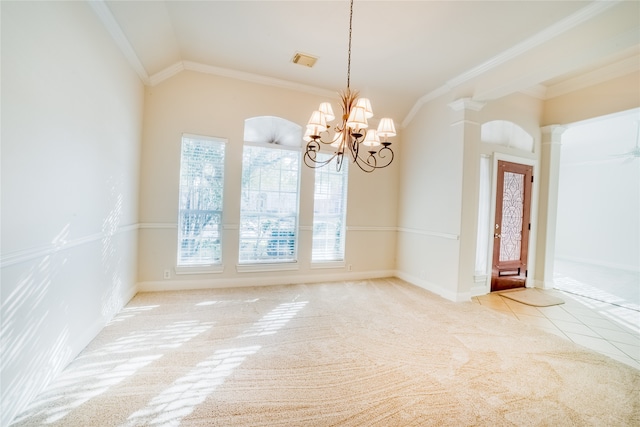 spare room featuring vaulted ceiling, light colored carpet, crown molding, and ornate columns