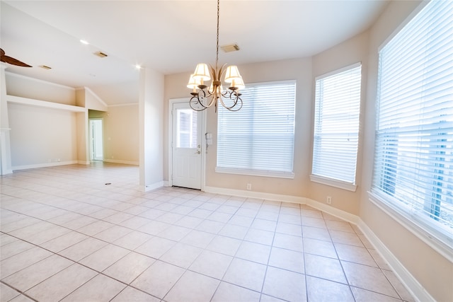 unfurnished dining area with baseboards, light tile patterned flooring, and a notable chandelier