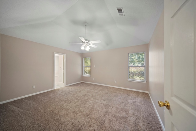 unfurnished room featuring lofted ceiling, carpet floors, and ceiling fan