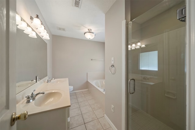 bathroom featuring vanity, independent shower and bath, and tile patterned floors