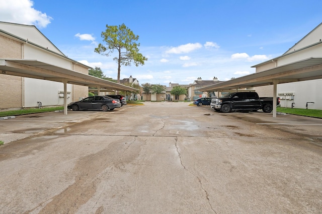 view of vehicle parking featuring a carport