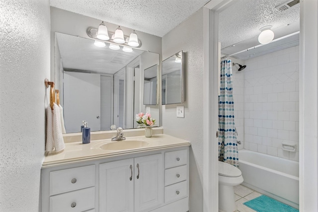 full bathroom with vanity, tile patterned floors, toilet, shower / bathtub combination with curtain, and a textured ceiling